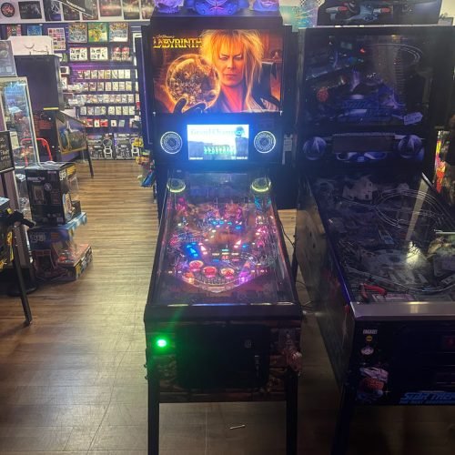 Jim Henson’s Labyrinth Pinball Machine with Official Topper for sale